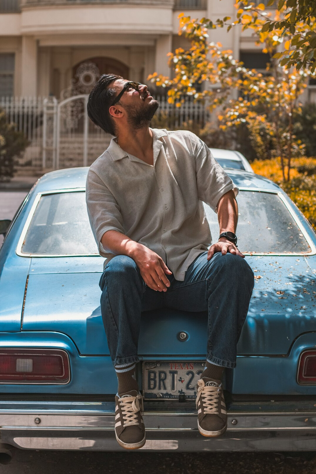 Portrait of a Latino man in his thirties with a beard and glasses