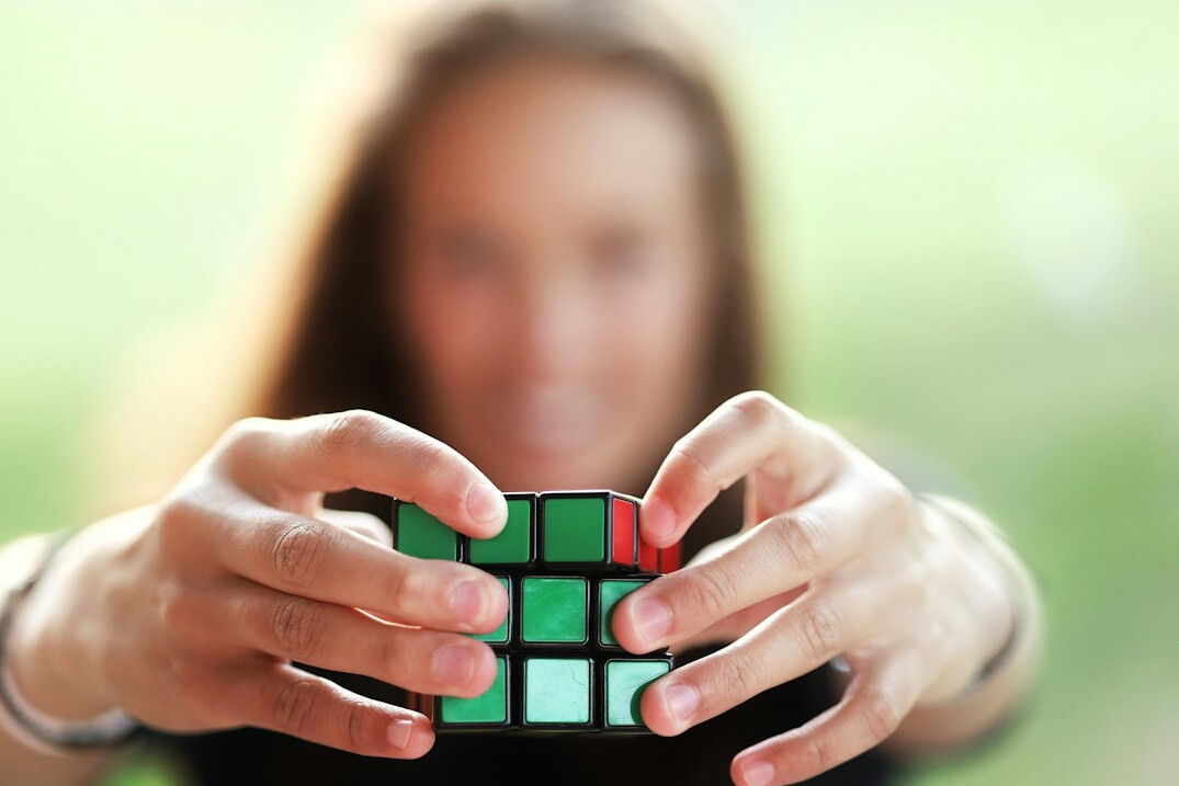 person solving puzzle