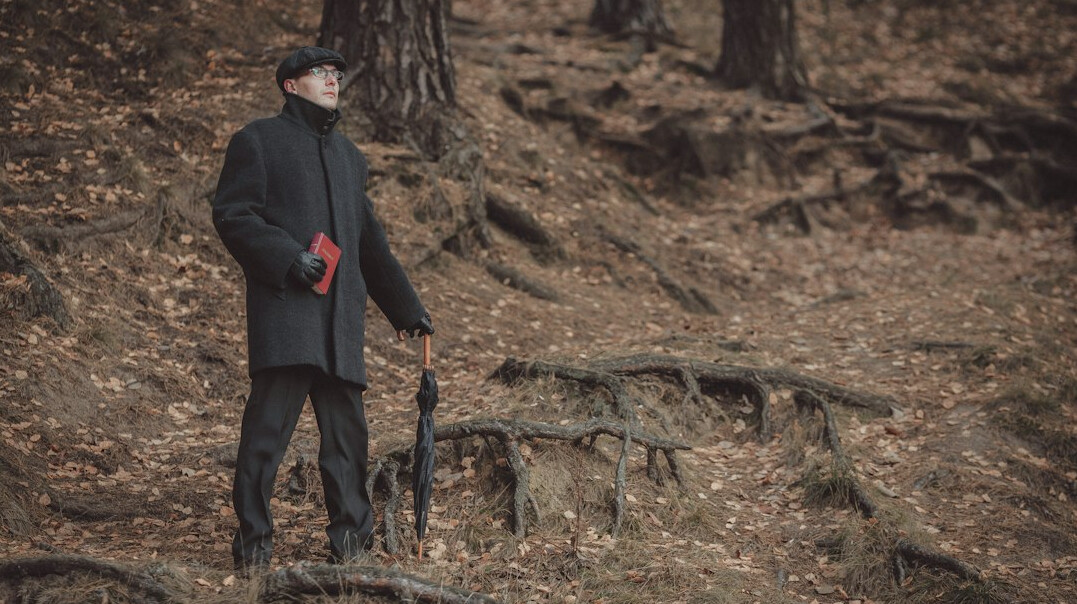 detective in trench coat solving case
